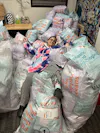 Ridwell employee with mail-in bags