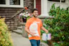 Ridwell employee collecting paint