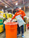 Ridwell employee sorting recyclables
